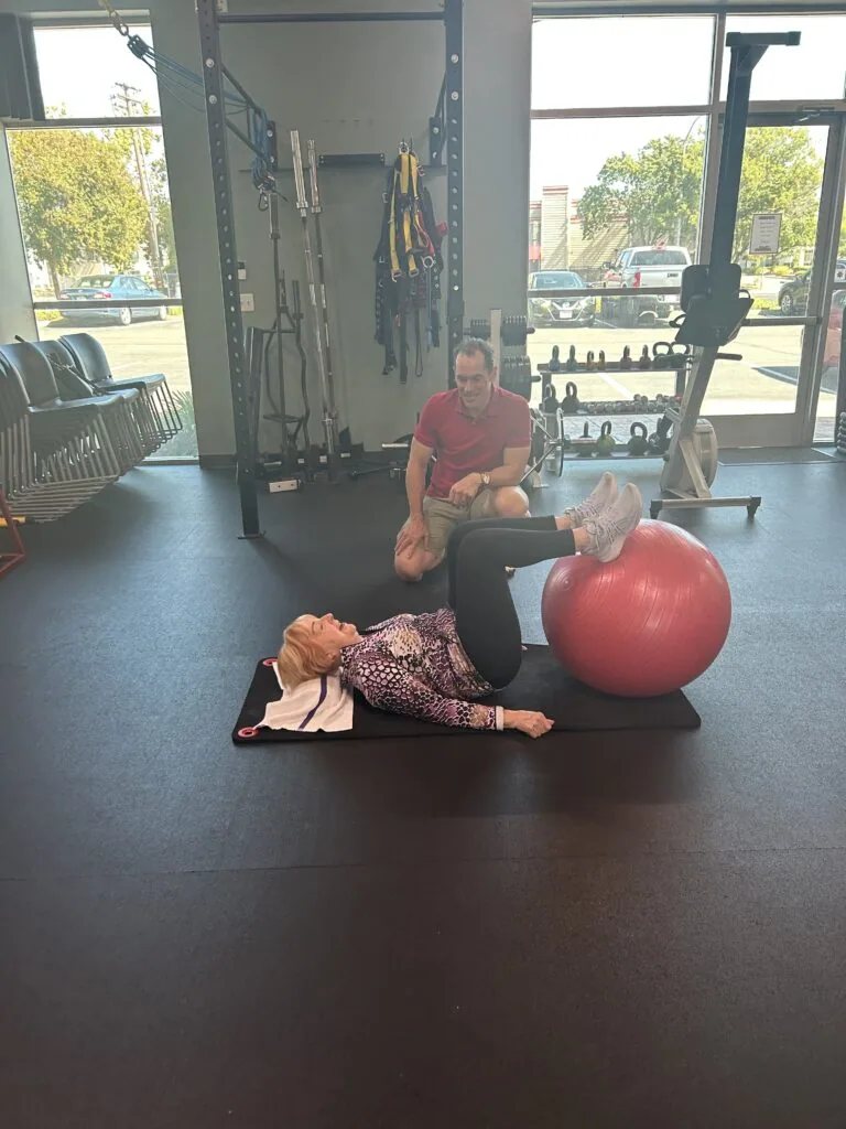 Trainer working one on one with a client